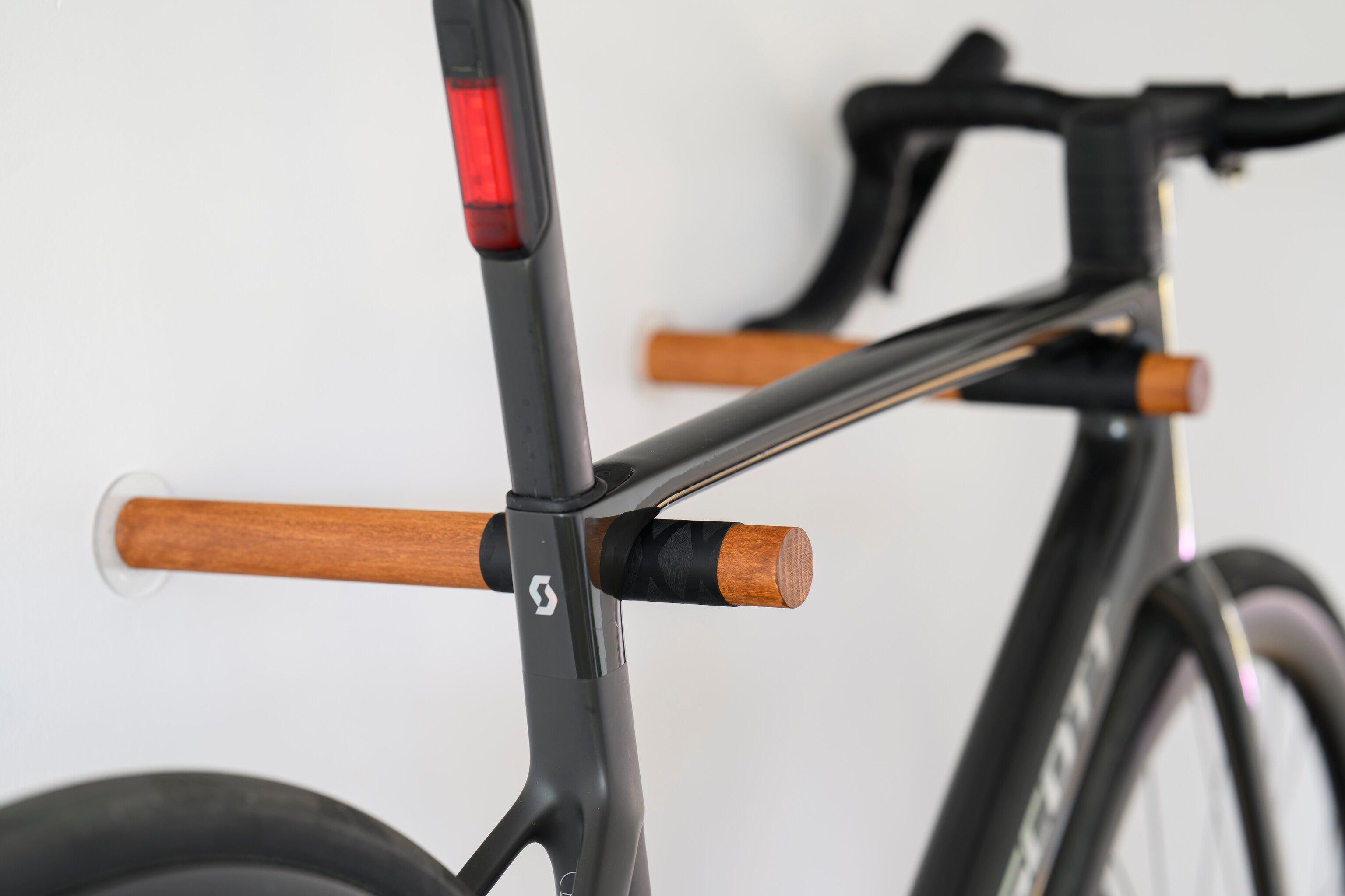 Natural walnut like grain with black wrapped bike hook detail